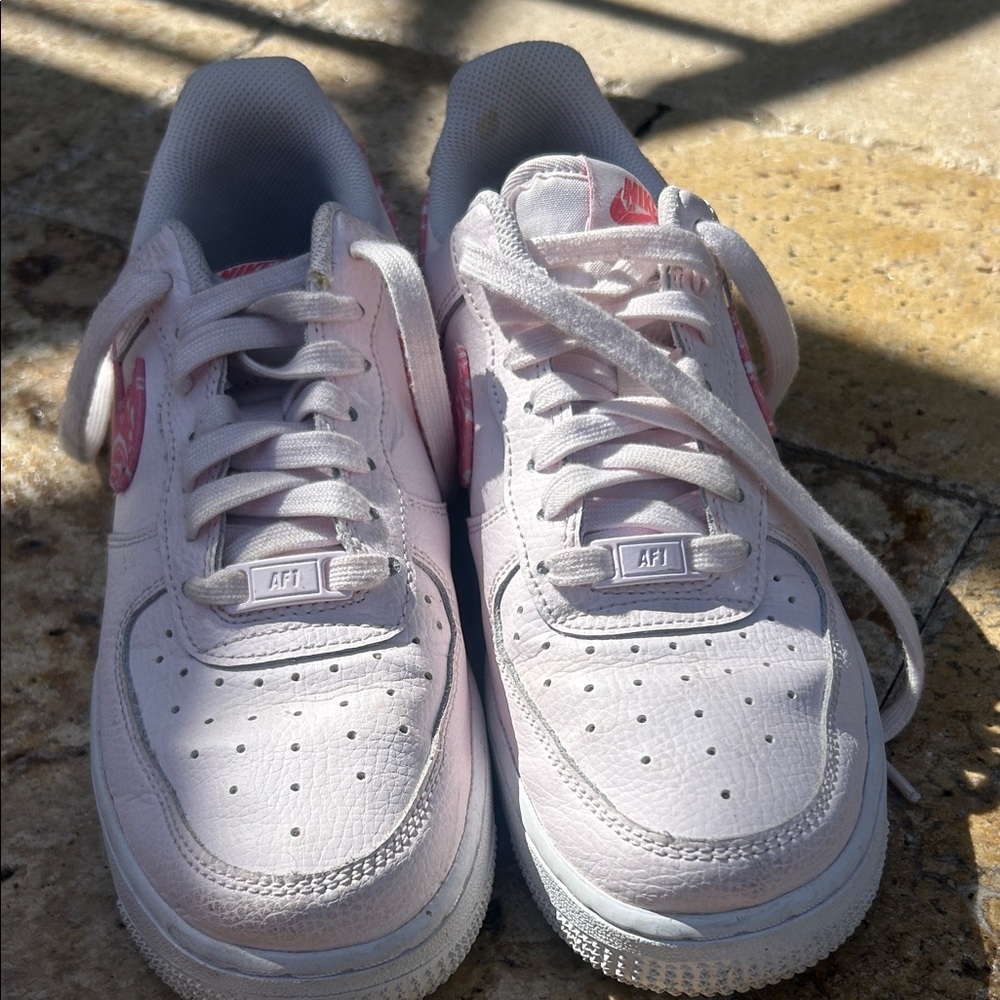 Nike Womens Light Pink Air Force 1 Low Sneakers.